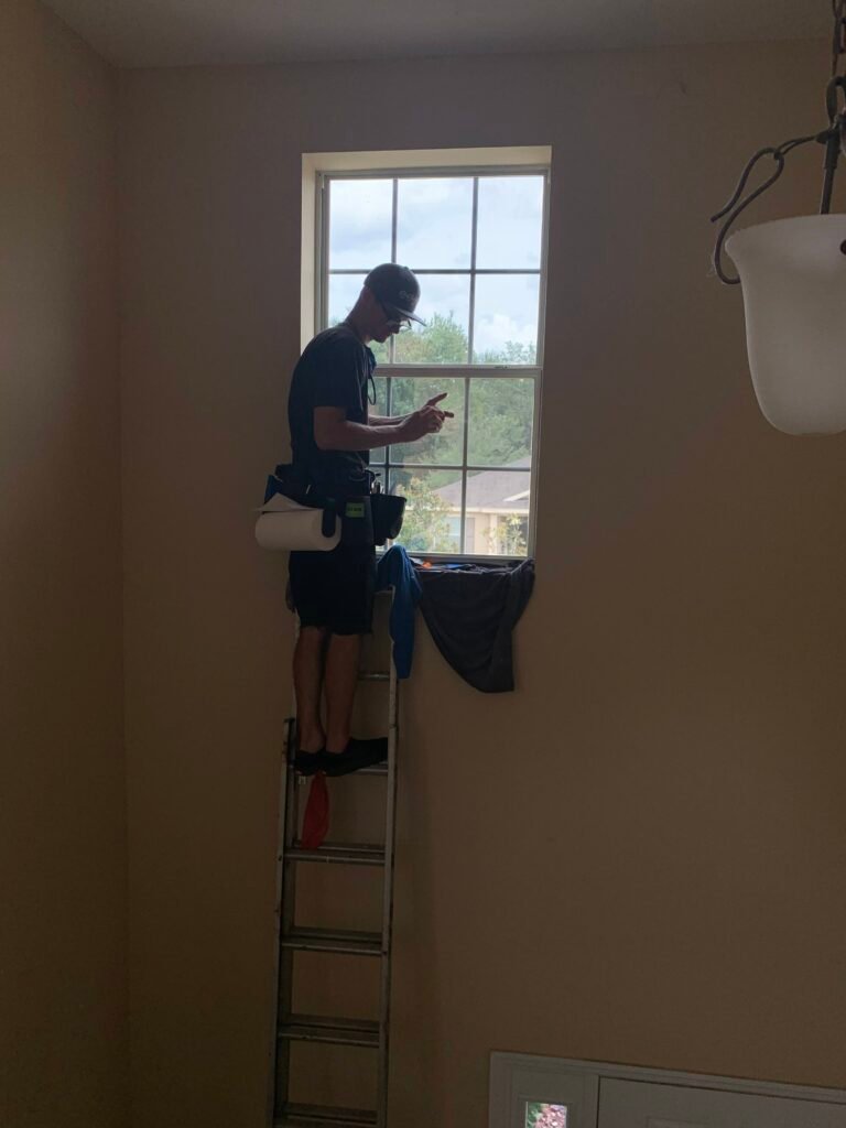Interior residential window film installation by Tint by the Bay on home glass in Pinellas County Florida