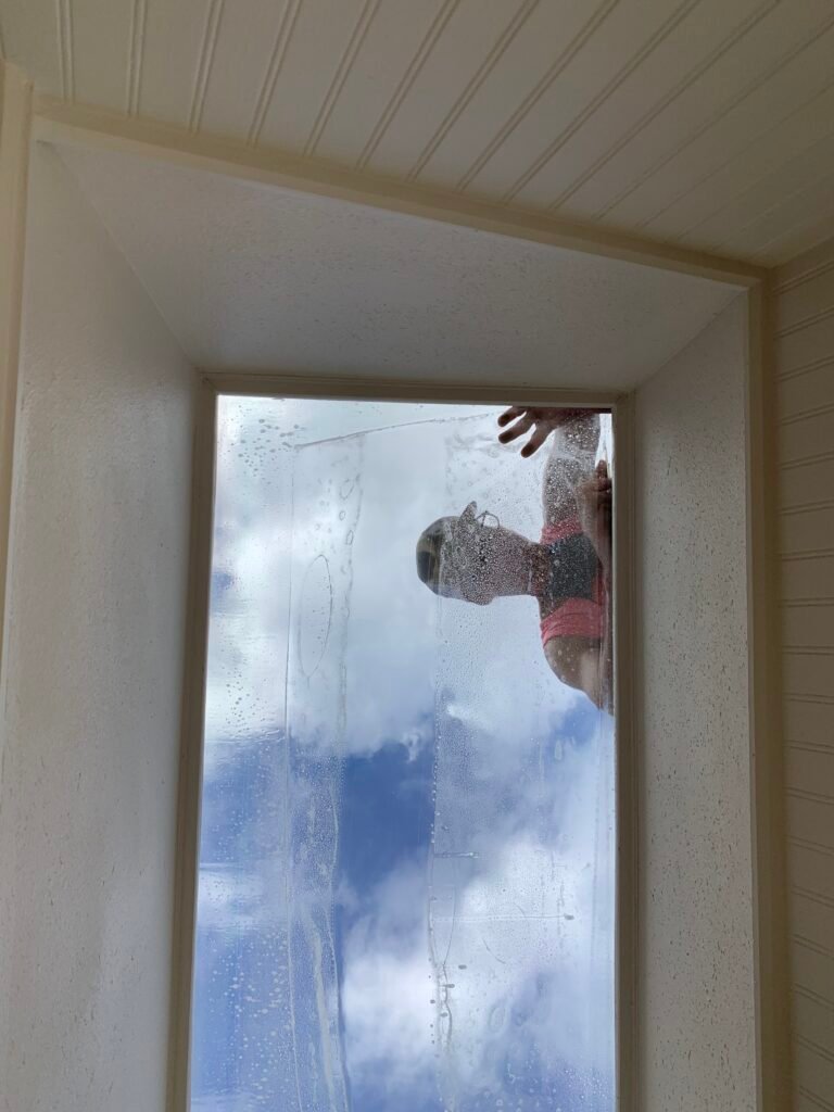 Residential window film being applied to home glass by Tint by the Bay