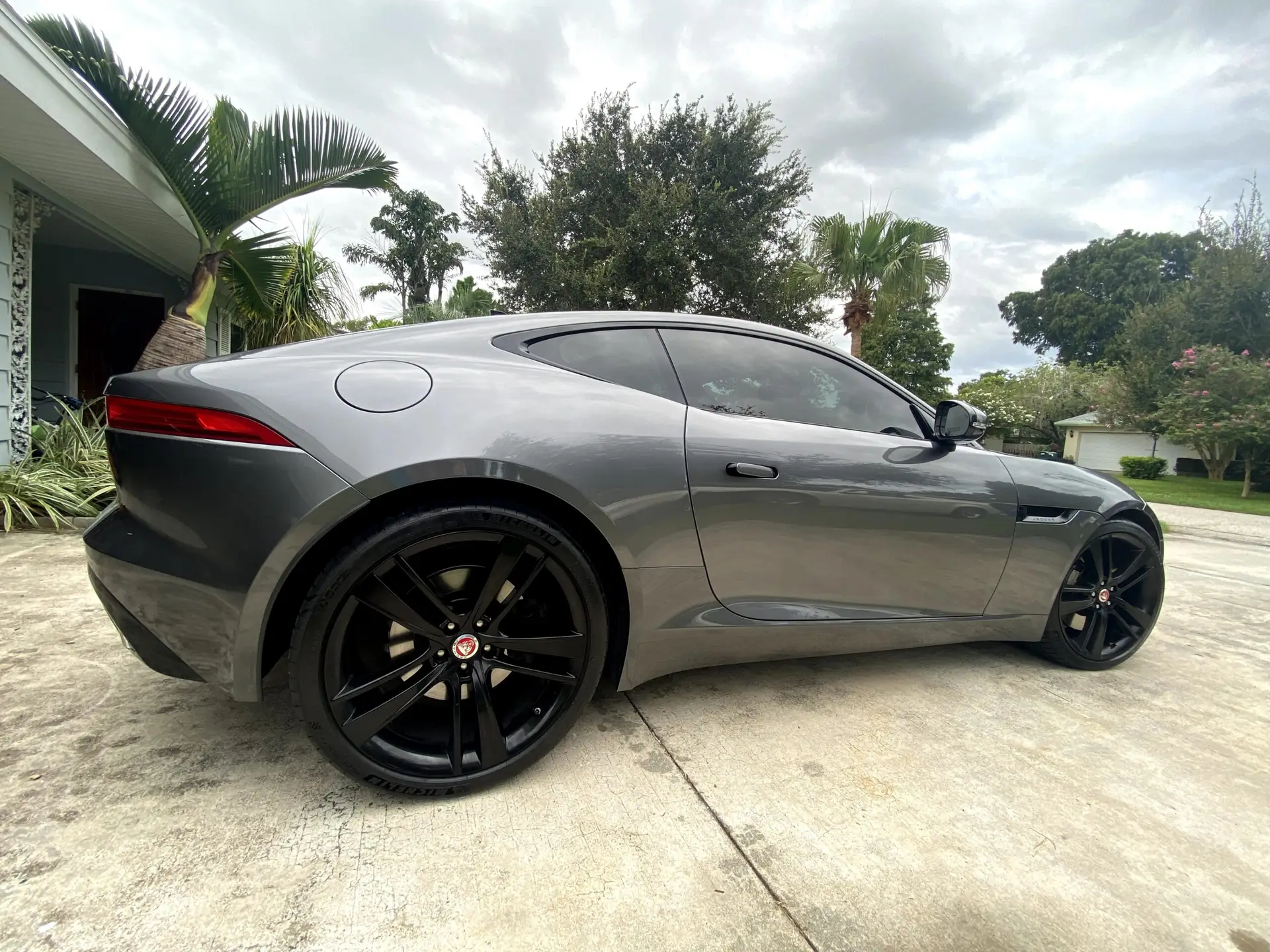 Dark gray Jaguar with ceramic coating finish at Tint by the Bay in Clearwater FL