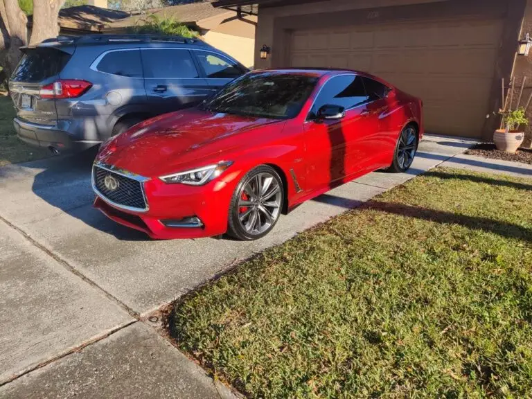 red vehicle vinyl styling project before trim wrap detail