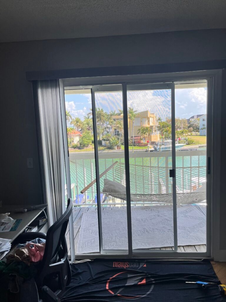 Residential window film on waterfront sliding glass doors in Clearwater Beach Florida