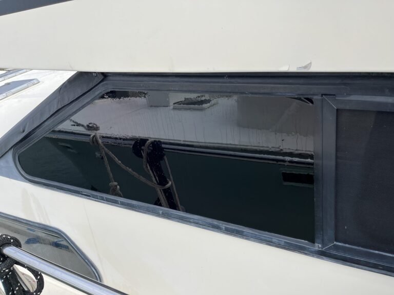 Close-up of tinted marine side window installed by Tint by the Bay