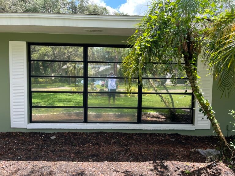 Residential window film on black framed home windows in Clearwater FL