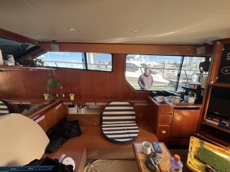 Interior yacht cabin view through tinted marine glass installed by Tint by the Bay