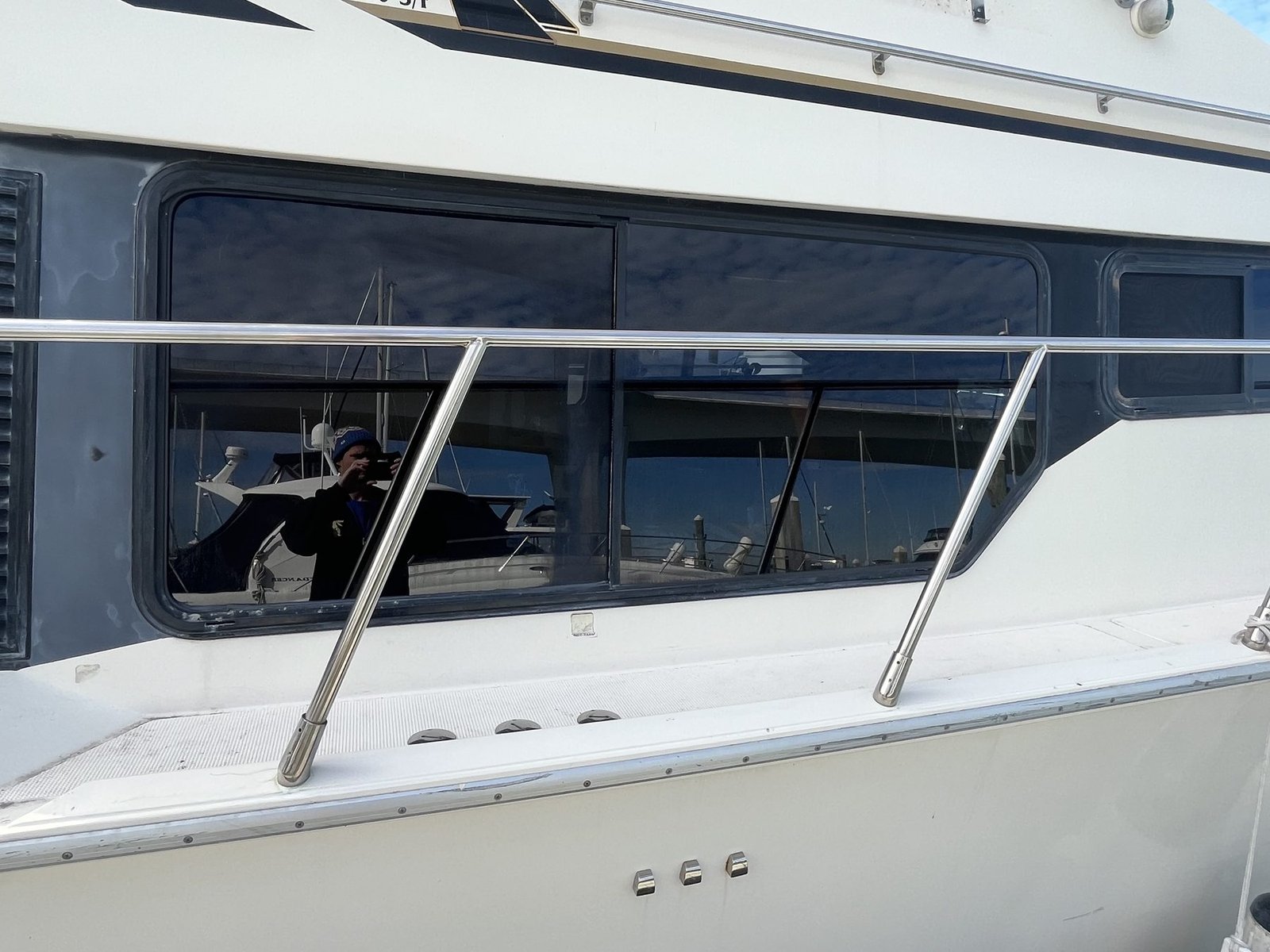 Yacht side glass with marine window tint installed by Tint by the Bay in Clearwater Florida